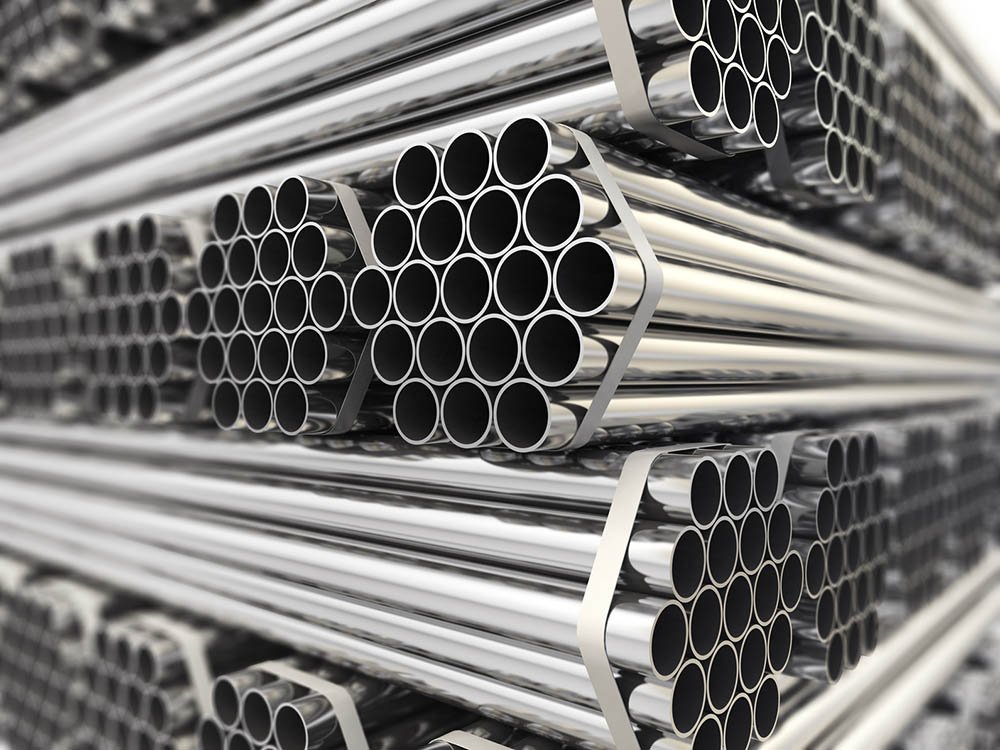 Rohrleitungen für Sanitär- und Heizungsplanung Gestapelte Metallrohre als Symbol für Rohrnetzberechnung, Sanitärplanung und technische Gebäudeausrüstung